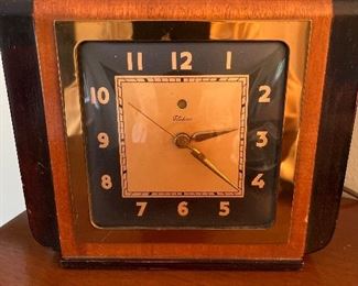 Bedroom #3:  A vintage Art Deco [Warren] TELECHROM  electric clock is displayed on the Art Deco chest.