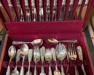 Family Room-Bar Area:  A set of vintage GODINGER "Olde Bouquet" silver plate flatware includes 12 dinner forks; 12 salad forks; 12 tablespoons; 12 teaspoons; 12 dinner knives; and nine serving pieces in a flatware chest.