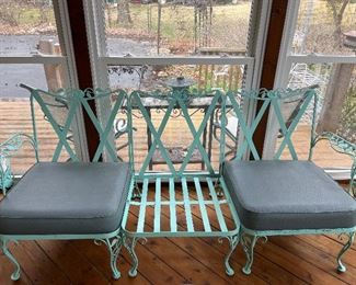 Sun Room:  The back cushions and one seat cushion have been removed from the Woodard "Chantilly Rose" three-section sofa so you can see the frame.  Note: the three sections are bolted together but could be separated.