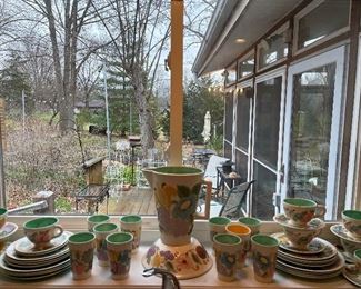Kitchen: Vintage hand-painted dishes, tumblers, a bowl, and a pitcher were done by "Aunt Ida."  The items are priced in two sets of service for four.  The pitcher and bowl are each priced separately though.