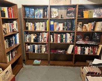 Lower Level:  The "library" has  fiction and non-fiction books which include cookbooks, history books, antiques, crafts and others.   On the floor are boxes of vintage cooking magazines.  Yes, the bookcases are also for sale.  (A nice collection of garden and plant books are in the nearby plant room.)B