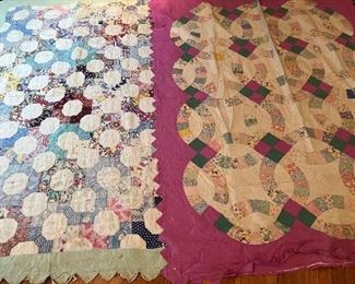 Bedroom #1:  Two vintage CUTTER quilts are shown:  the left one is in the "Snowball" pattern; the right one is the "Wedding Ring" pattern.