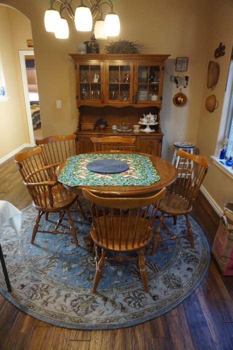 Dining Table with chairs. China Hutch, rug