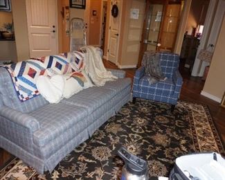 couch and chair, rug