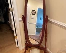 $160 USD     Vintage Standing Oval Mirror LL127-2      Description: This Cheval mirror will ensure both you and your bedroom or dressing room look divine. Simple oval design confirms you look great in any light and from any angle. Attached to a sturdy stand, mirror flips for convenience. The mirror is finished in warm brown that blends in to any decor. You'll always step out looking impeccable, whether for a wedding or trip to the farmer's market.

Condition: Very good condition.

Dimensions: 59"H

Local pick up Alexandria, VA.  Contact us for shipper suggestions.      https://goodbyhello.com/products/standing-oval-mirror-ll127-2?_pos=4&_sid=f0cdb1161&_ss=r