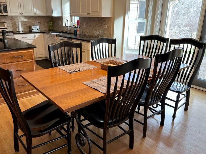 Nichols & Stone kitchen table, (with 2 leafs - 112" long) and seven chairs...very nice! Table has iron base, see next photo...