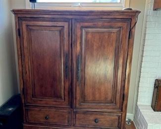 Custom TV cabinet and matching bookcase. Low profile and great for sides of fireplace