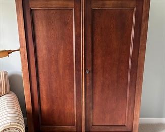 Storage cabinet/armoire and nightstands are National Mount Airy