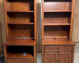 Pair of bookcases/computer cabinets. Right piece has computer keyboard drawer