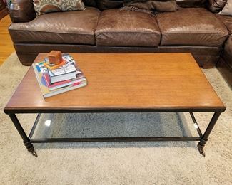 Industrial style coffee table on casters