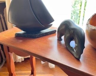 Carved stone figurines.