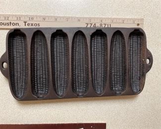 Antique cast iron corn cob shape muffin tin.