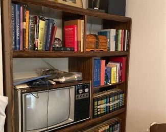 ENTERTAINMENT CENTER FULL OF BOOKS, TV AND MORE!!