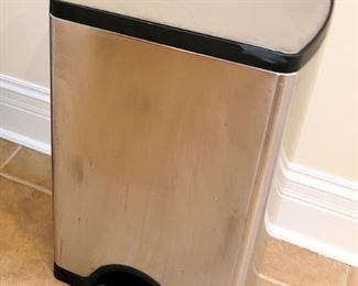 Garbage can. (2 touchless motion sensored stainless steel cans available - not shown)
