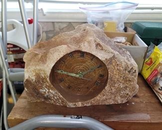 Carved stone clock