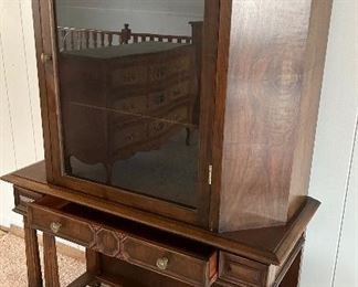 Antique Glass Front Curio Hutch w/ carved wood open base w/ center drawer 40.25”w x 16.5d x 63h $165