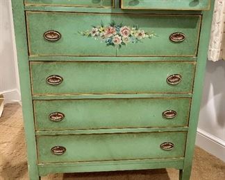 Antique mist green, 6 drawer dresser/chest on wheels w/ brass handles, Painted pink floral trim on top 3  drawers 32”w x 20d x 47”h $165