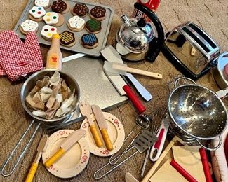 Doug and Melissa Play utensils & Food:
Cookie canister, 12 cookies, cookie sheet, silver spatula & 2 oven mitts $15
Pasta, pot, colander, 3 Metal cooking tools, 2 wood plates, forks, knives $15
Tea kettle $10, Toaster $10