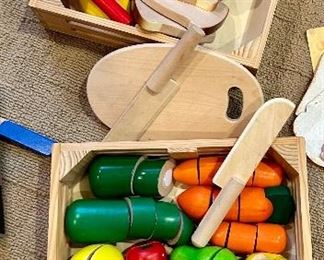 Doug and Melissa wood play food:
fruit & veggie bin with cutting knife $30
Watermelon & bread crate with cutting knife $15
