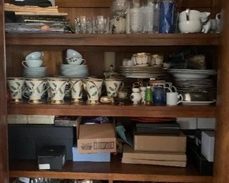 Large assortment of dishes crystal glasses, trays