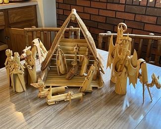 Carved bamboo nativity set with crèche 