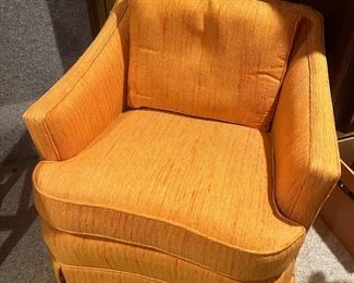 Vintage upholstered orange armchair!