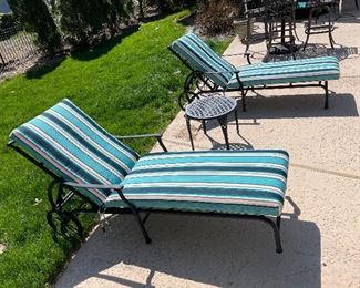 Sold as pair, chaise lounges with cushions