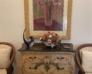 Murano bird on console. Framed flower art is sold.