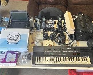 Electronic table, Phone, Camcorder, Casio keyboard optelec reader much more