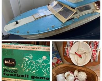 Vintage toy boat, child’s picnic basket and Tudor electric football game. 