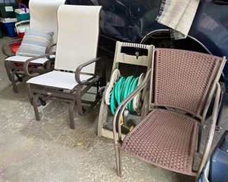 Patio chairs and hoses 