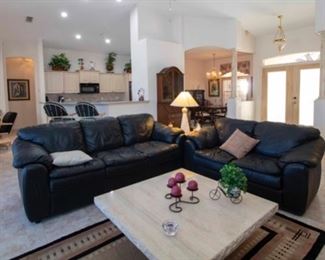 Leather Couches and marble table