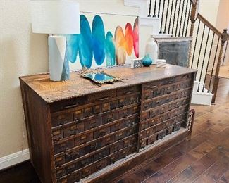 Antique apothecary chest with drawers