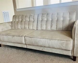 Couch folds flat into a bed. Like new condition.