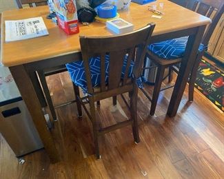 Bistro height, kitchen, table, and chairs