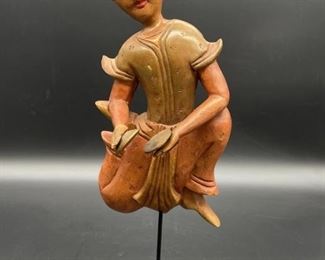 Wood Carving of Asian Temple Musician on Stand