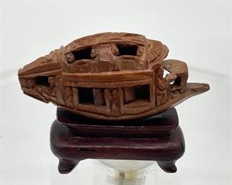 Intricate Miniature Carving out of Pecan Shell
