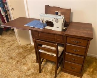 Vintage Elna sewing machine - works - and sewing cabinet. Selling together.