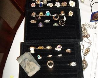 LOTS of jewelry - fine and costume, Judith Ripka, good bit of turquoise.  Rings, necklaces, bracelets, slides/pendants for necklaces, earrings, etc.