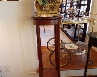 Tall round pedestal.plant stand