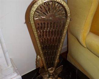 Beautiful brass peacock fireplace screen with gargoyle