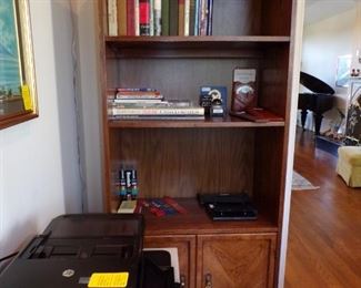 Bookcase with drawers, books, drafting kits, etc.