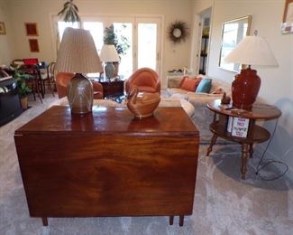 Wide Board Drop Leaf Table, round revolving bookcase table, lamps, etc.