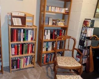 more books, arm chair and ottoman, etc.