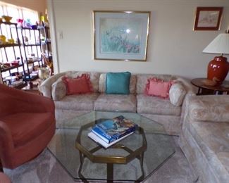 sleep sofa, brass and glass coffee table, etc.