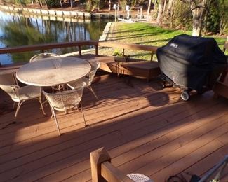 metal round patio table with 4 chairs, grill, etc.