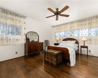 Sleigh brand bedroom suite.  Trucker branded steamer trunk. Highboy is also available but out of the view in this picture.  Beautiful set.