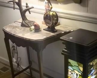 Antique French table was $900, now $720, Lamp was $400, now $320