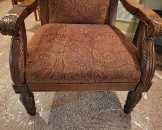 ASHLEY BRAND - DECORATIVE SITTING CHAIR W/UPHOLSTERED PAISLEY SEAT & BACK ALONG WITH CARVED WOOD DETAIL - RETAILS FOR $395, OUR PRICE IS $175