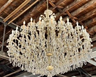 Oversized antique crystal chandelier salvaged from Truman Corners Movie Theater - the same style is hanging in Mission Hills Country Club. Asking $4000. Buyer must move.